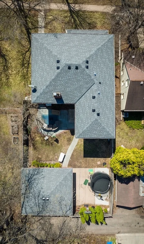 Roof replacement for a home and garage in St. Paul, Minnesota